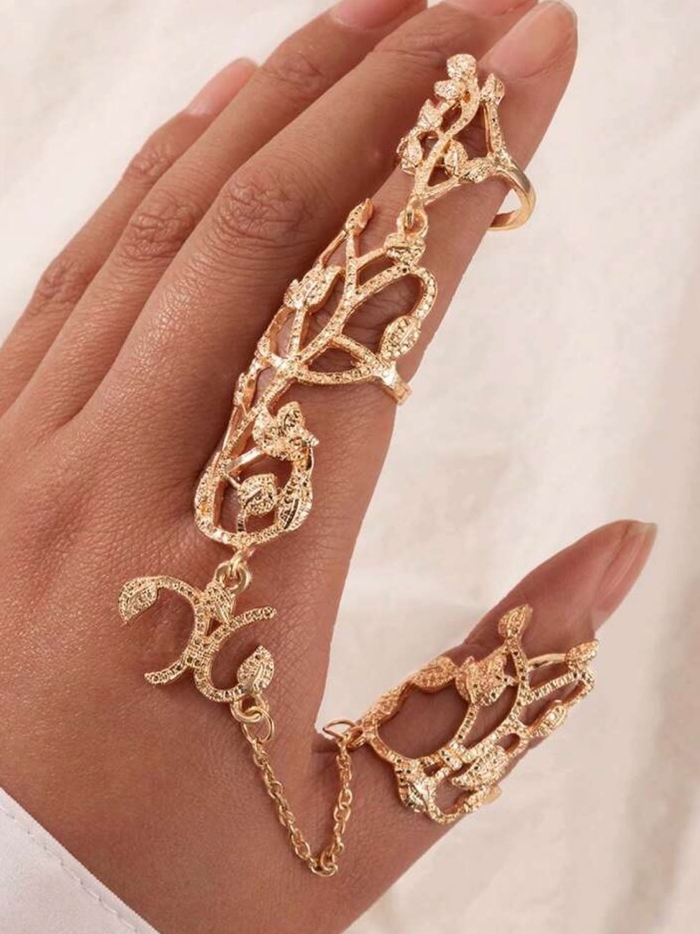 Ornate Crystal Hand Harness with Sculptural Botanical Motifs